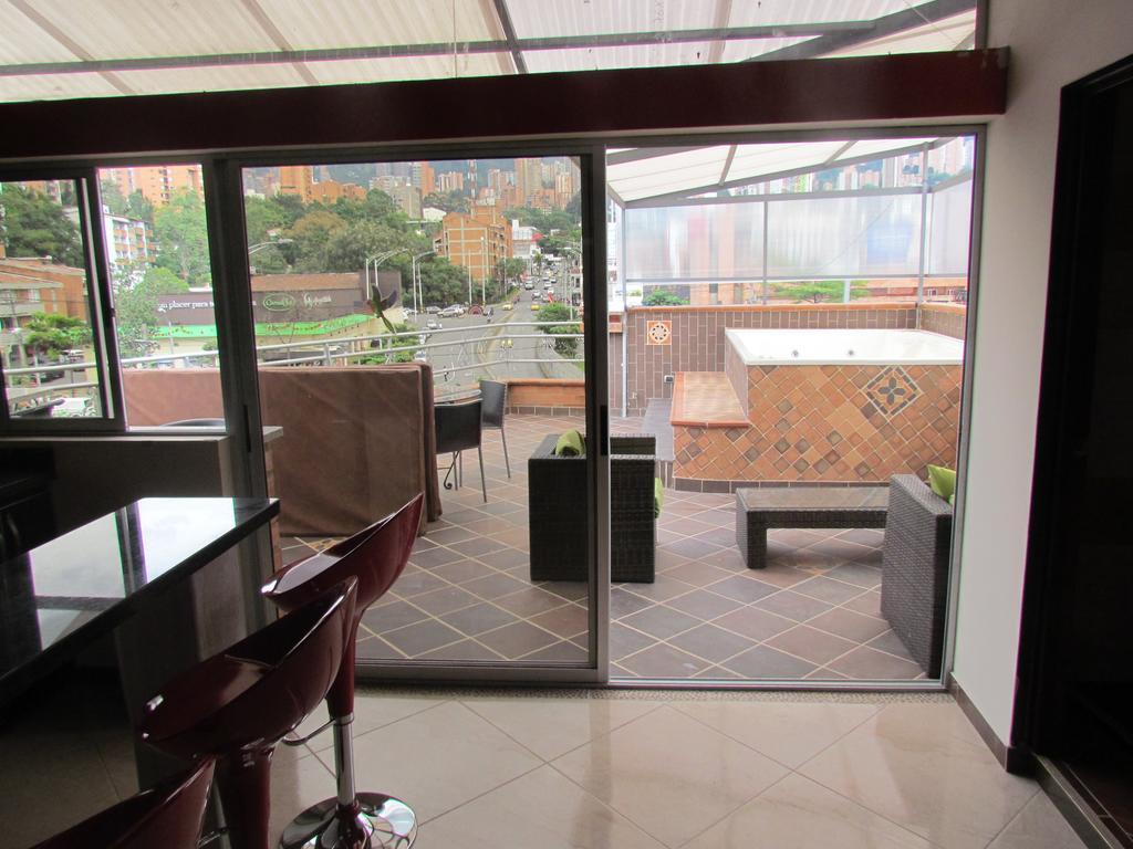 Calle 10 Suites Medellín Habitación foto